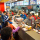 People ordering in a fast food line